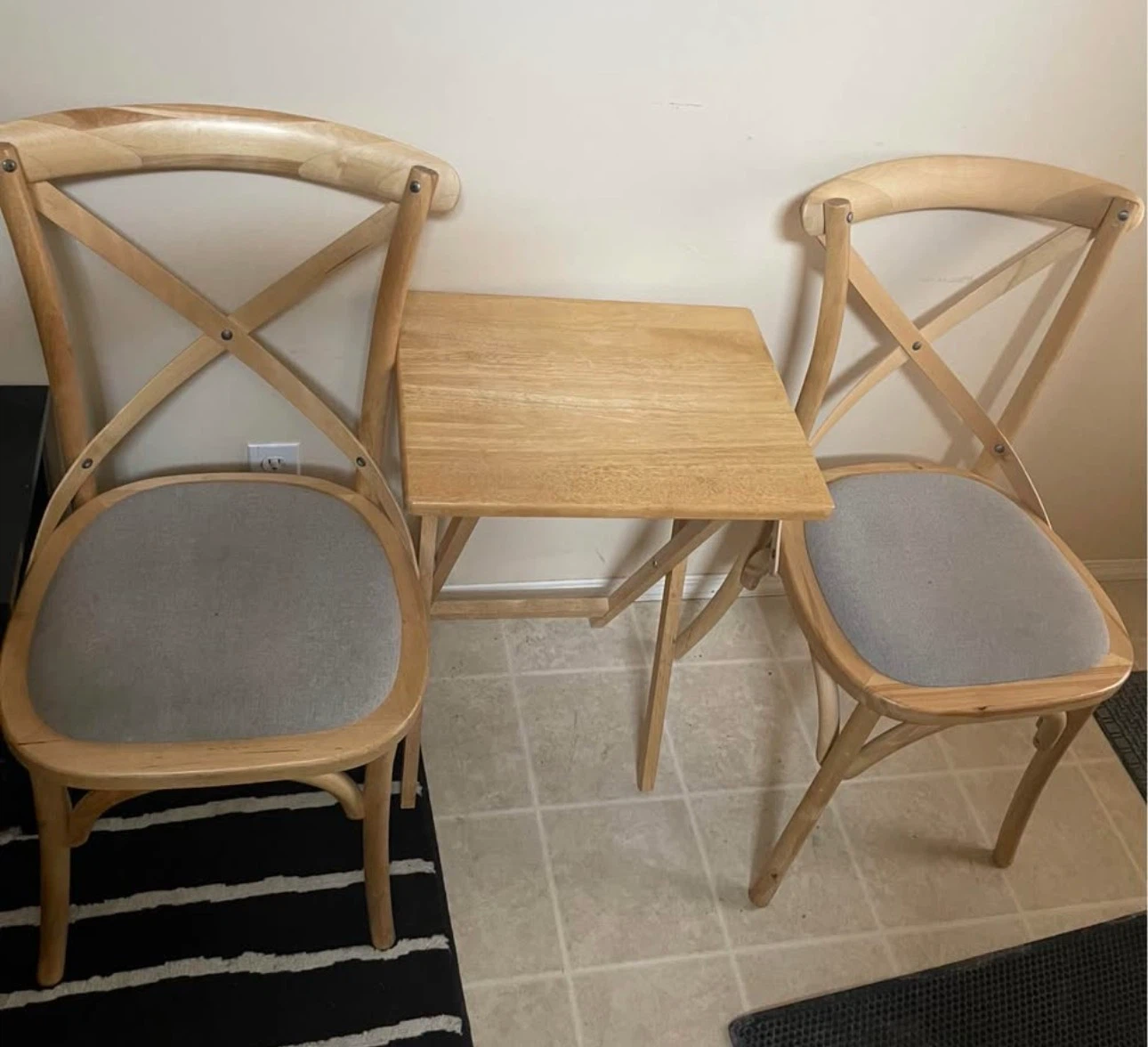 Two Wooden Cross-Back Chairs with Grey Cushions