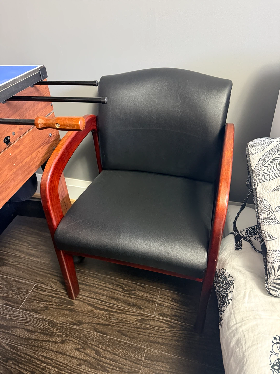Black Armchair with Wooden Frame