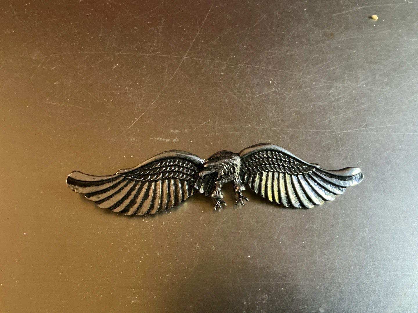 Spread-winged, bald eagle pin