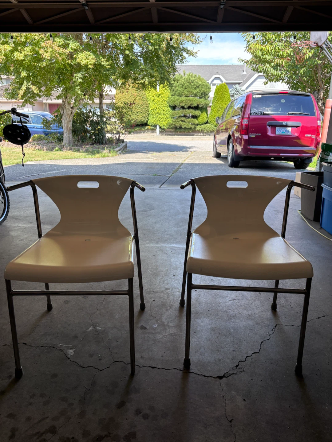 Pair of Cream Plastic Chairs with Metal Legs