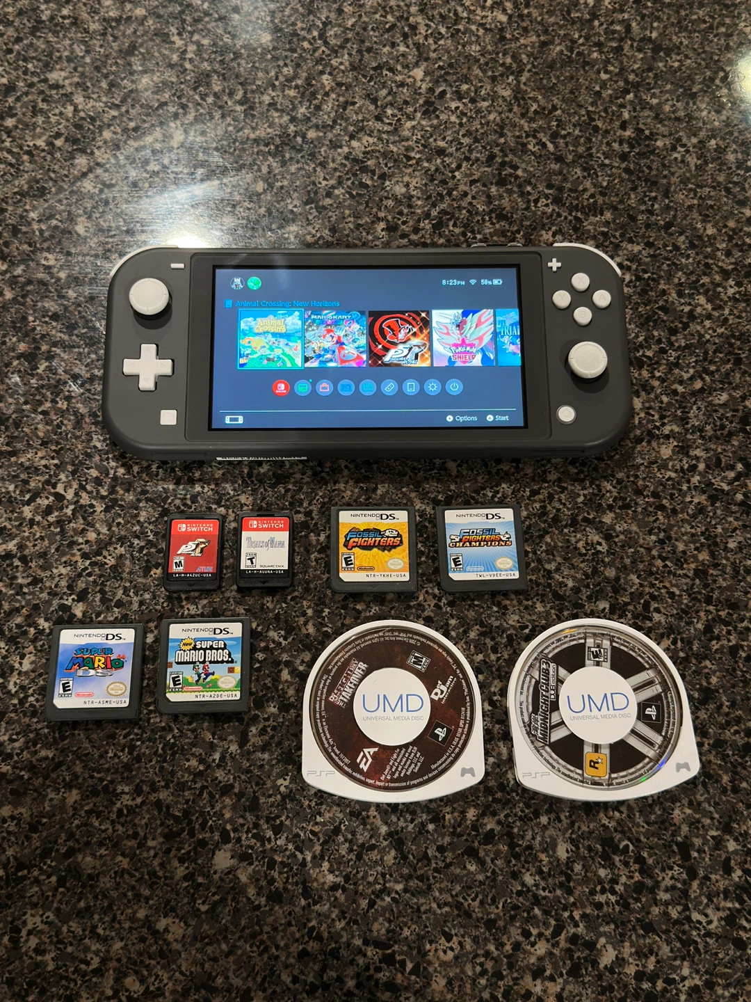 Nintendo Switch Lite Console and Assorted Games