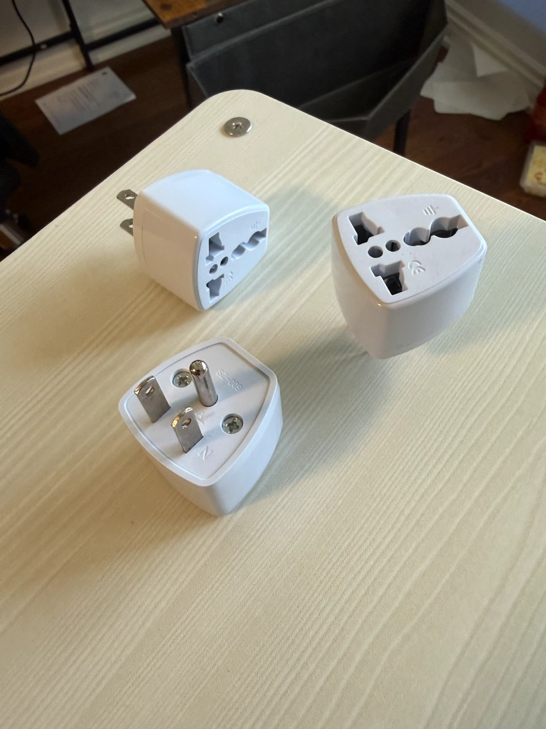 3 Universal Travel Plug Adapters — $8