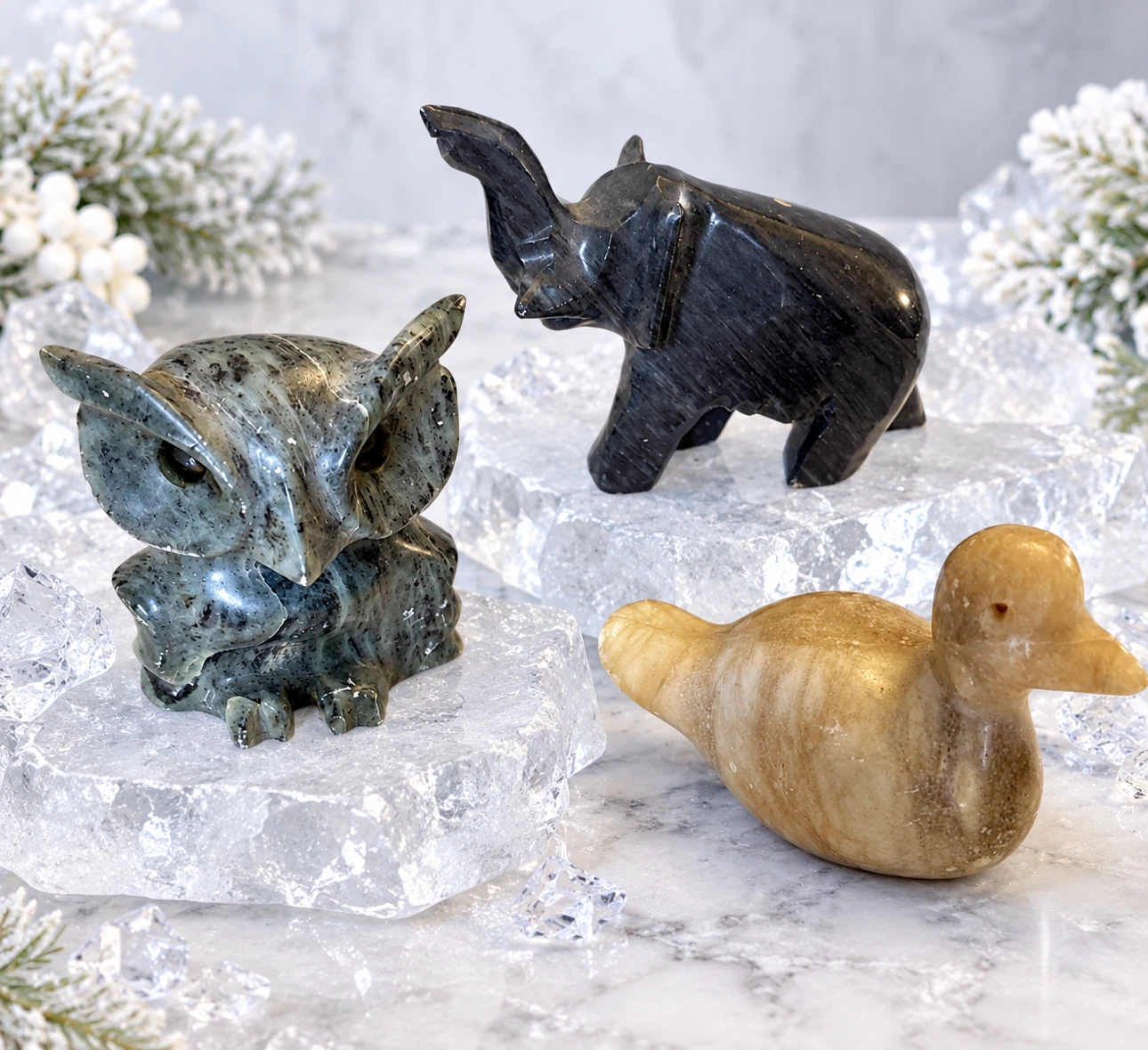 A trio set of marble figurines