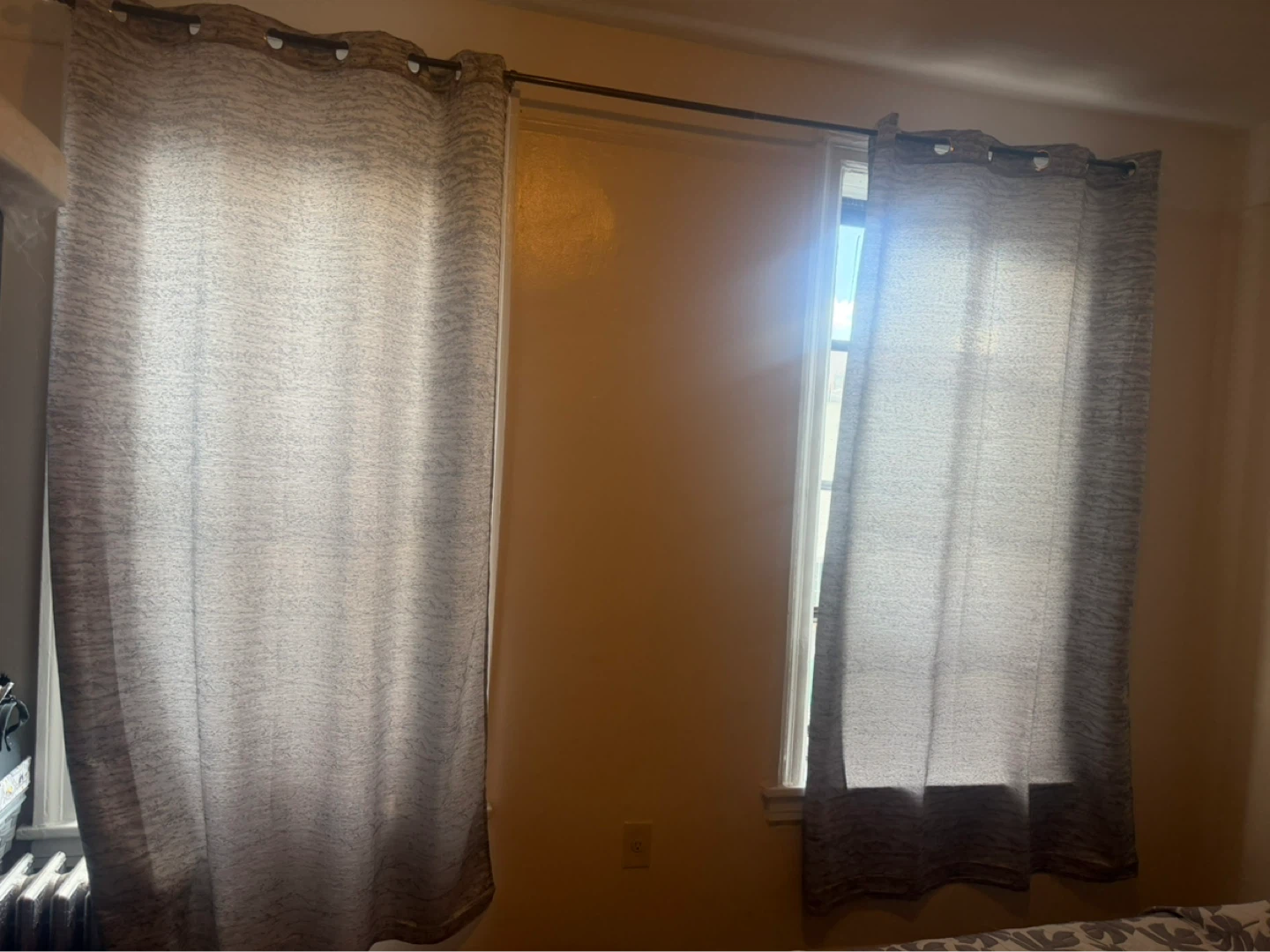 Gray Textured Curtains and curtain pole