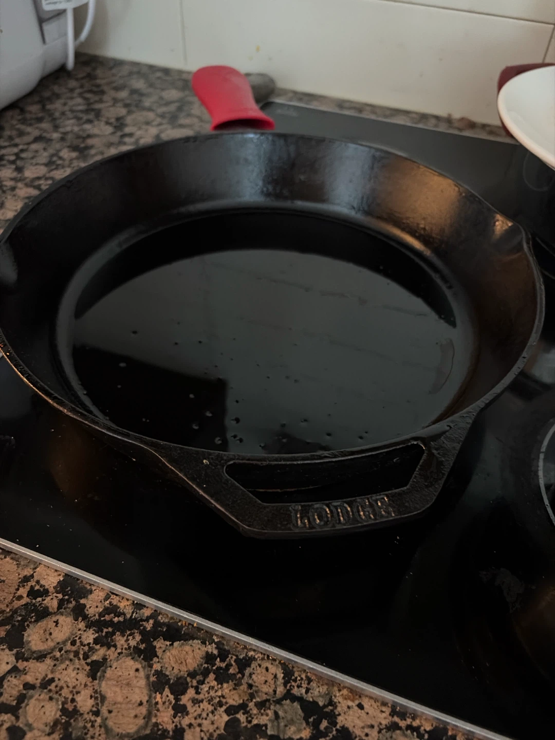 Lodge Cast Iron Skillet with Red Handle Cover