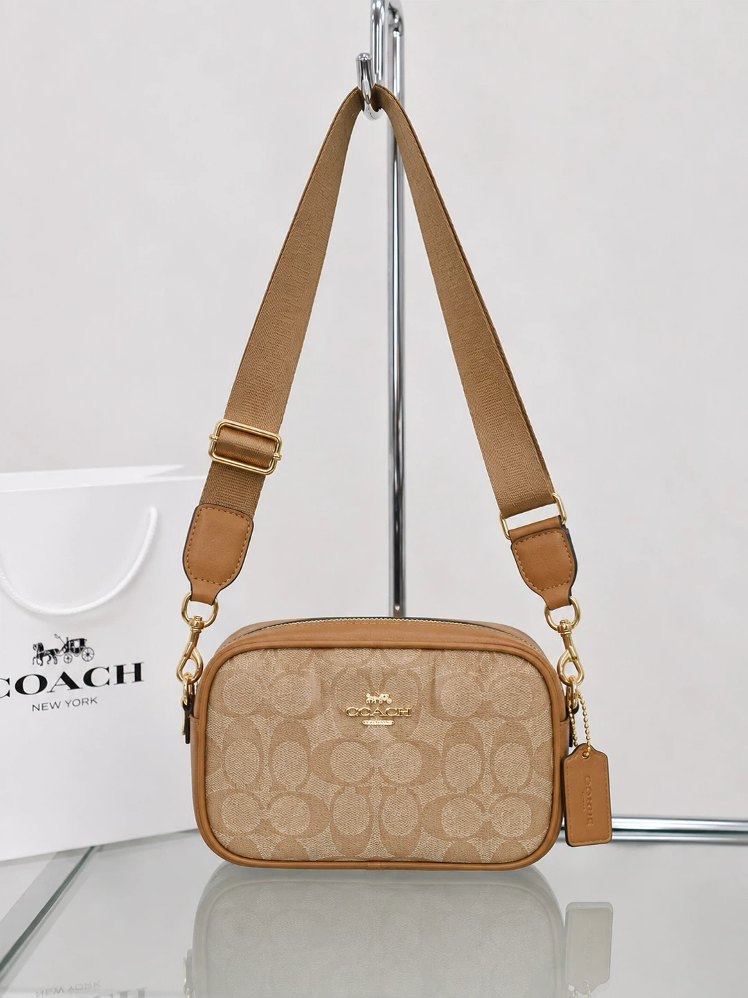 Tan Signature print women’s handbag