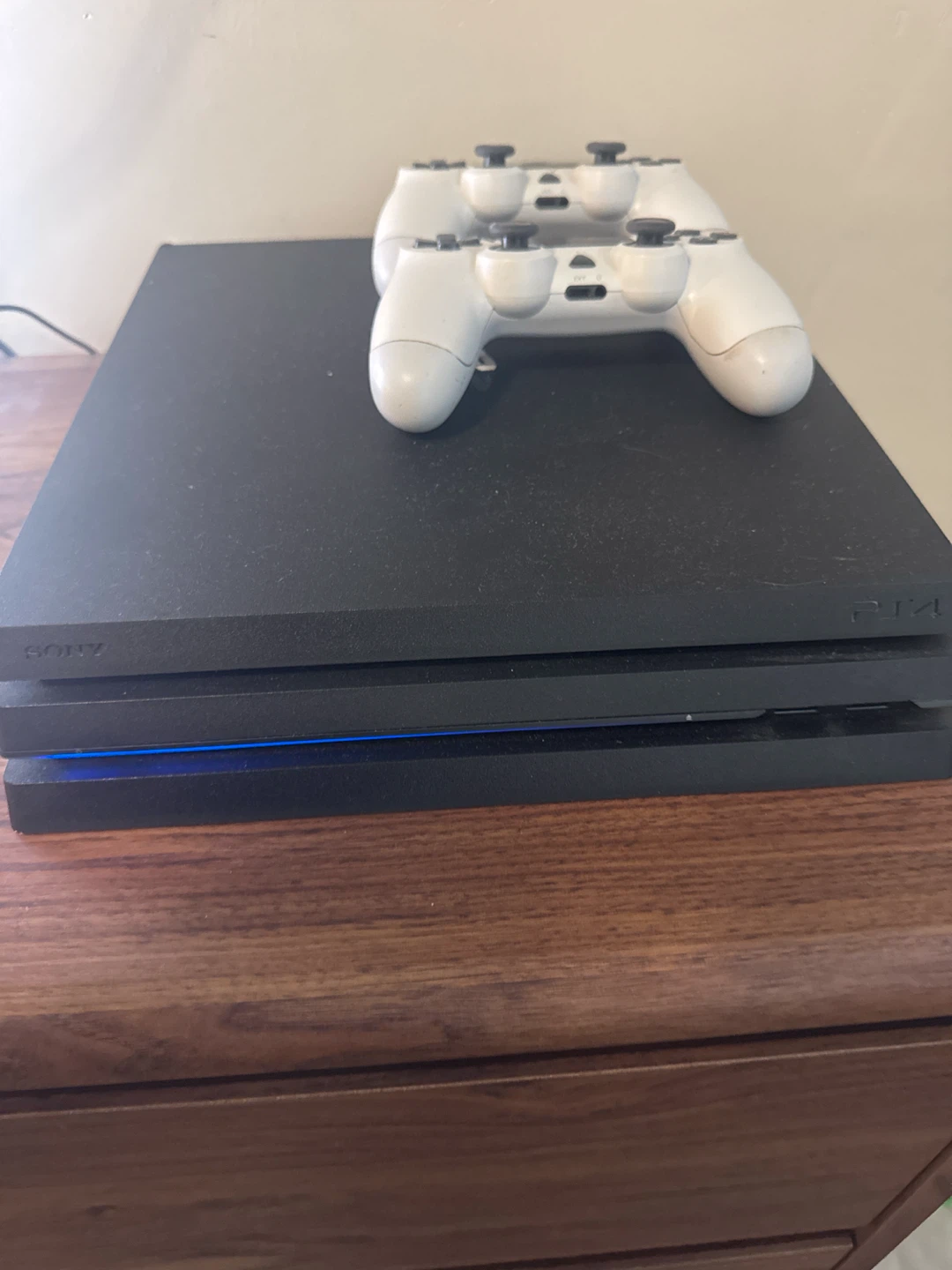 Sony PlayStation 4 Pro Console with Two Controllers - photo 2