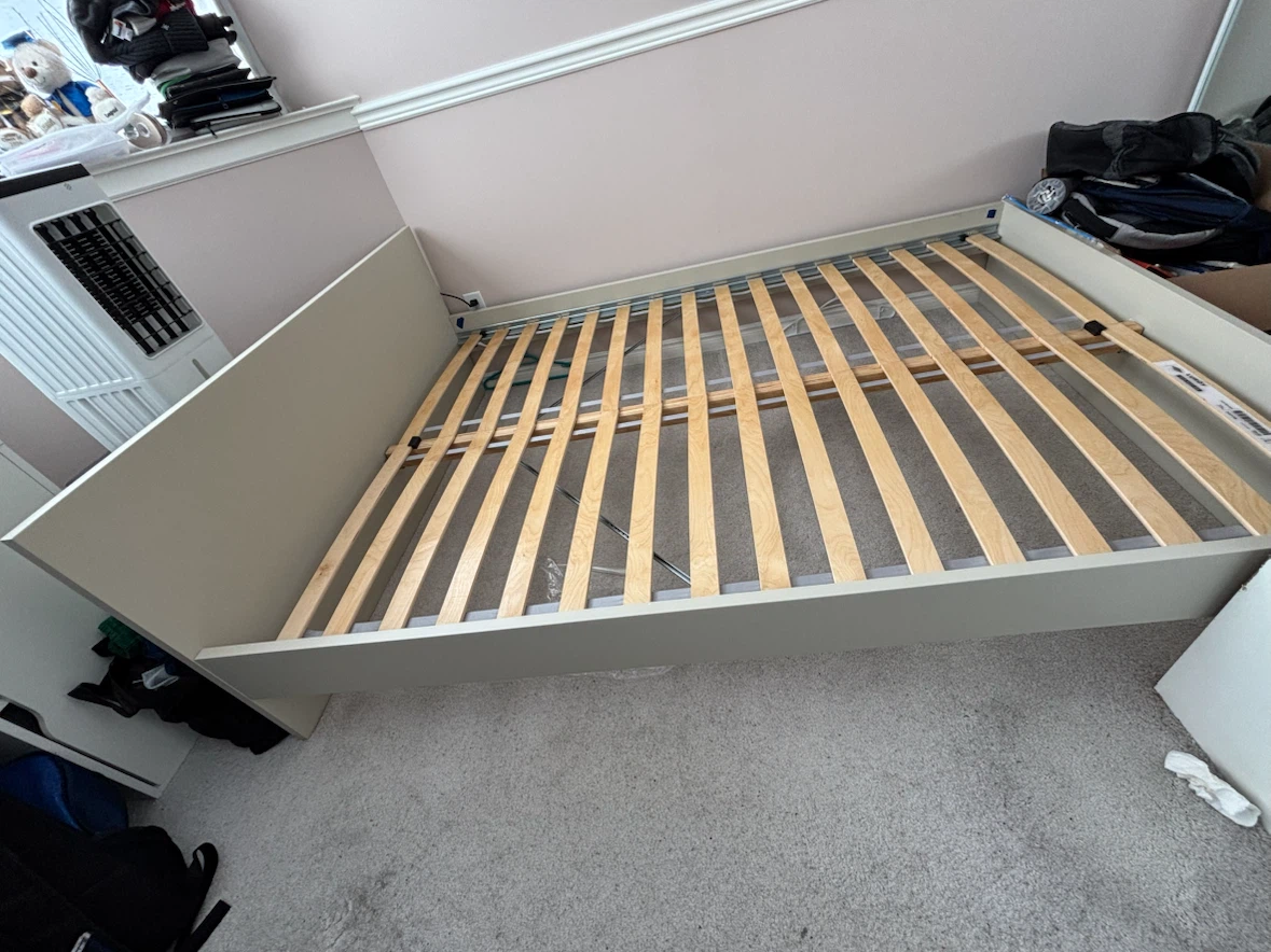 IKEA bed frame with wooden slats