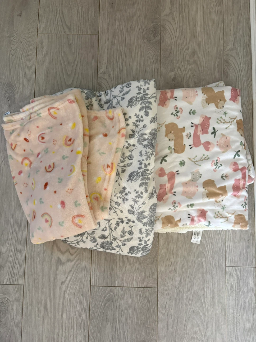 Three George baby blankets