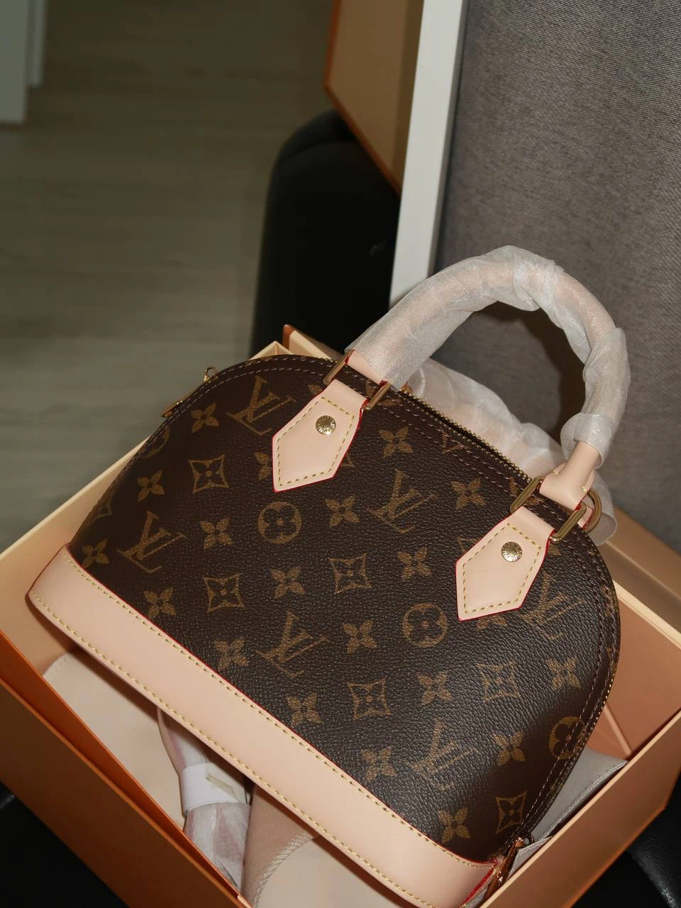 Louis Vuitton Alma BB Monogram Handbag