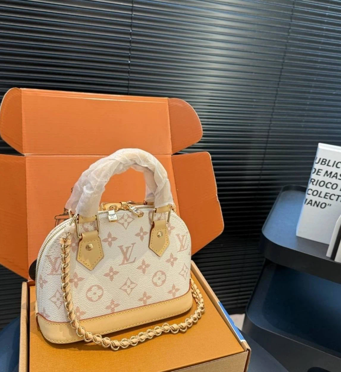 Louis Vuitton Alma BB handbag