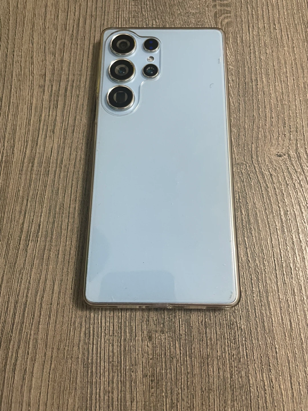 Light Blue Cell Phone with Clear Case - photo 2