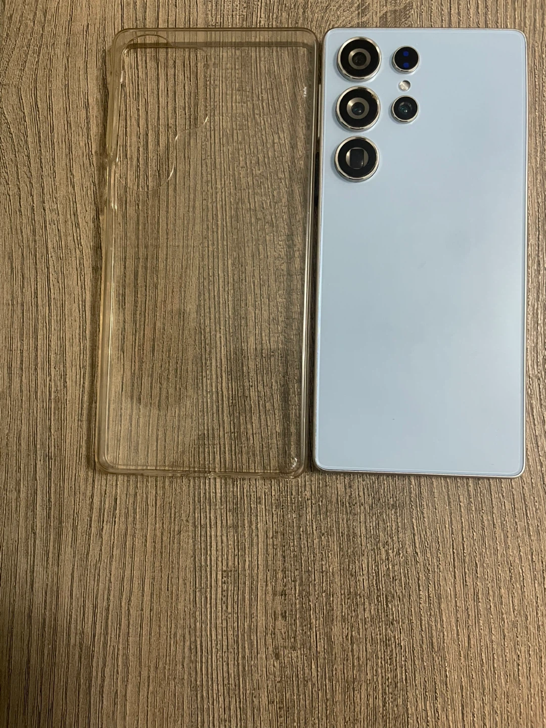 Light Blue Cell Phone with Clear Case - photo 3