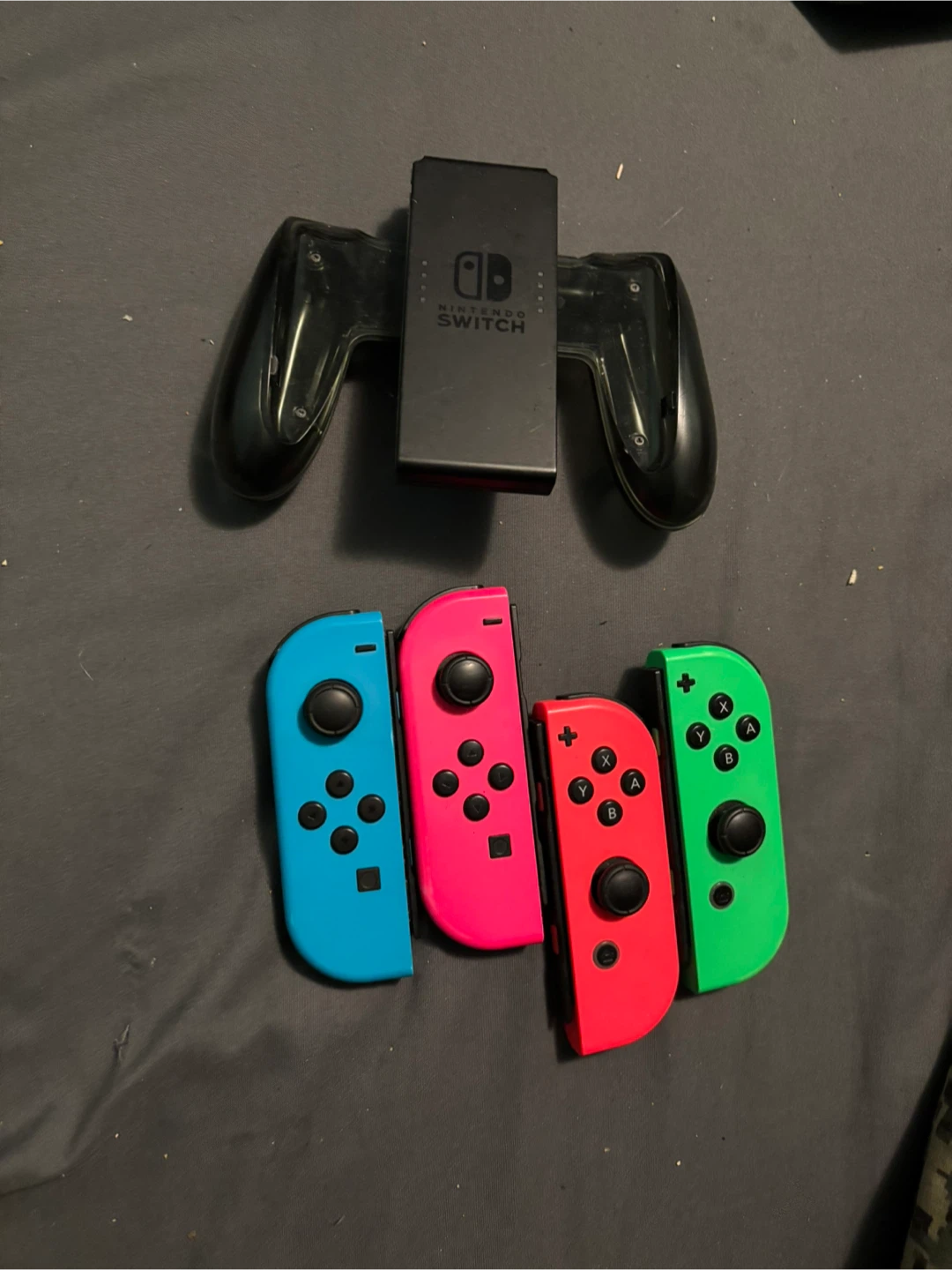 Nintendo Switch Joy-Con Controllers and Charging Grip