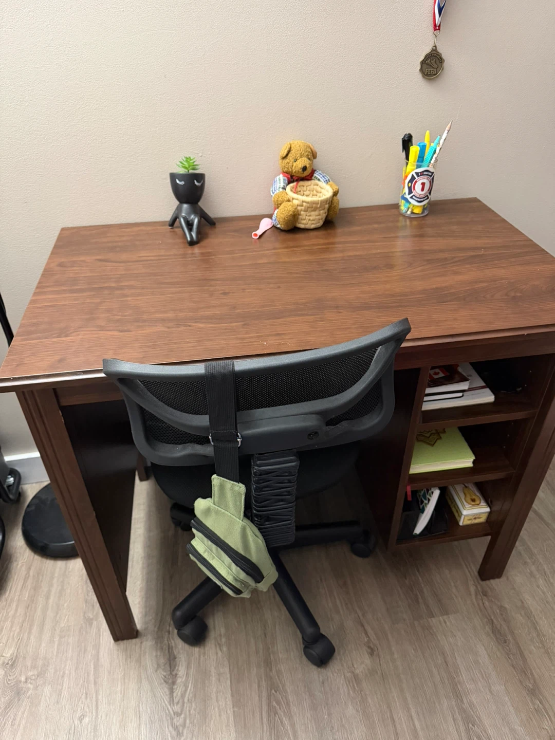 Dark wood study desk with side shelving