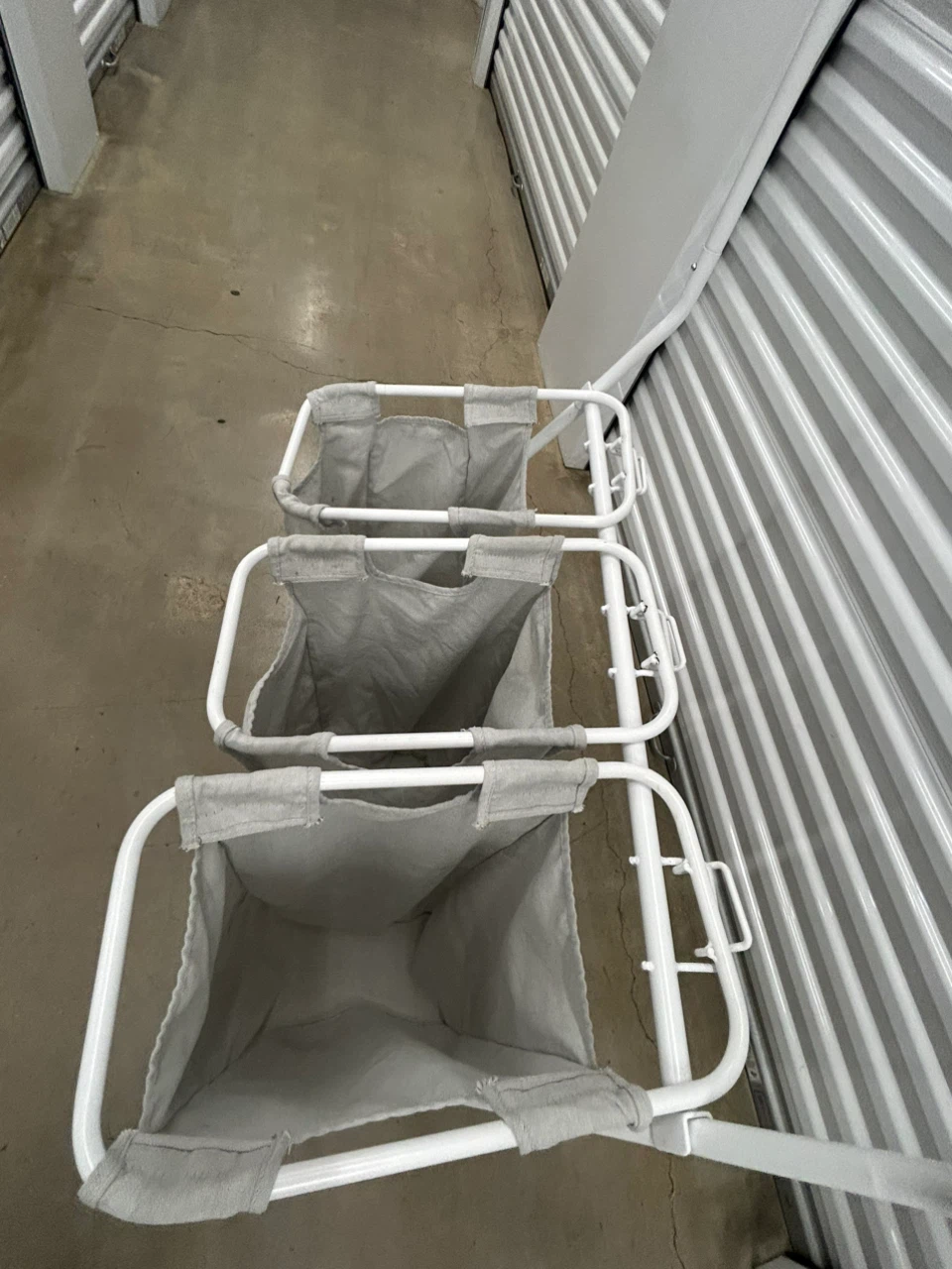 3-Bag Rolling Laundry Sorter with Hanging Bar - photo 3