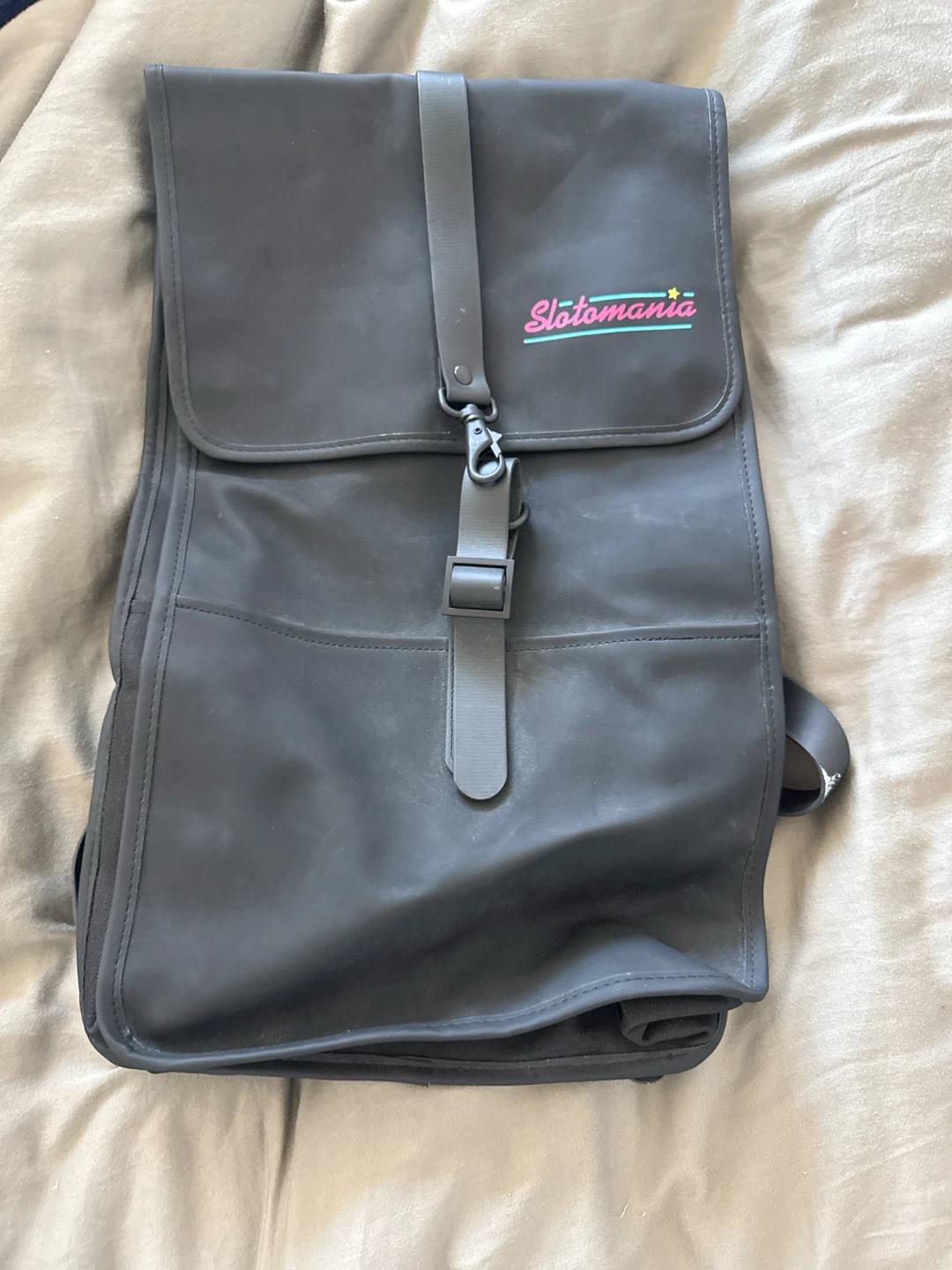 Black Slotomania branded backpack