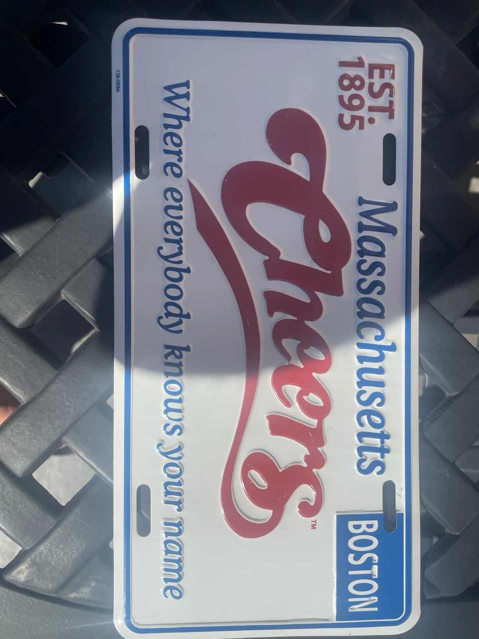 Metal Cheers license plate