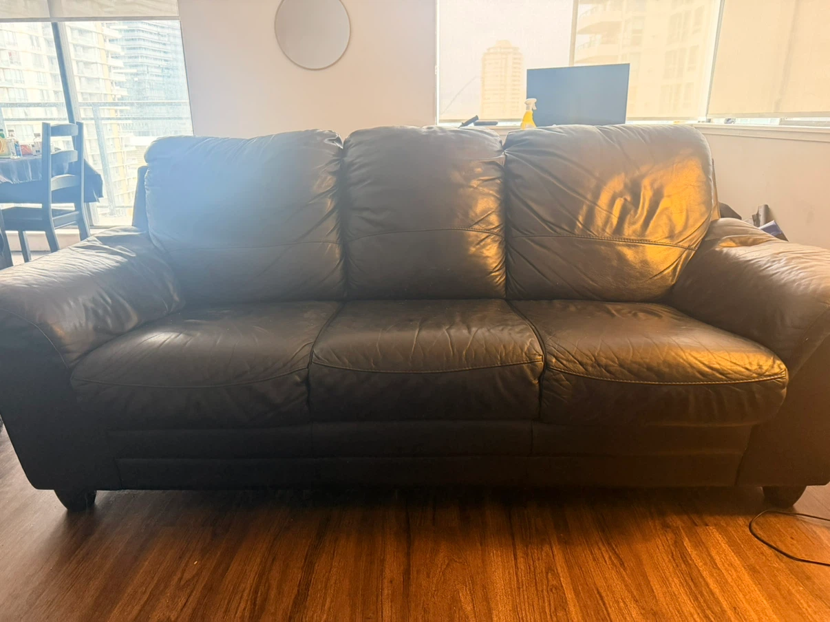 Black Leather Three-Seater Sofa