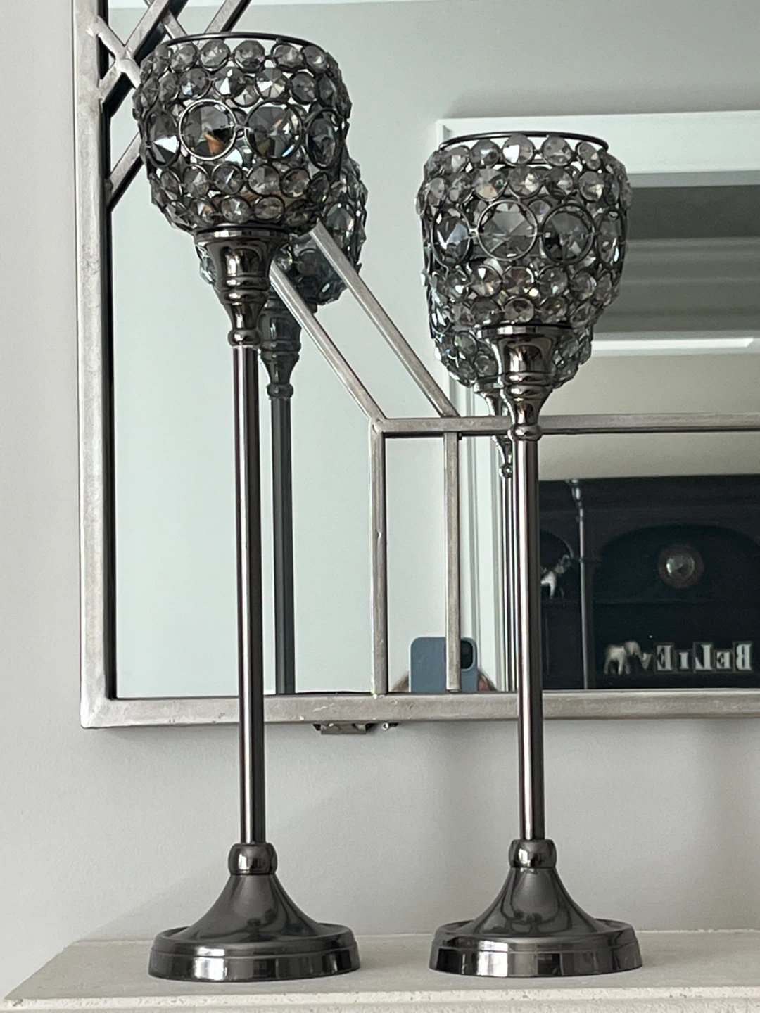 Set of tall metal and crystal candle holders