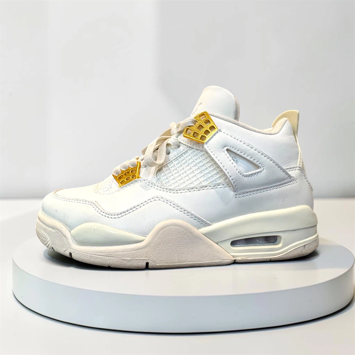 Nike Air Jordan 4 Metallic Gold Sneakers