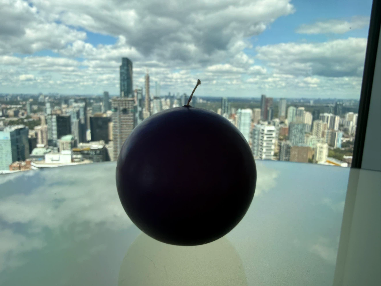 Purple spherical candle