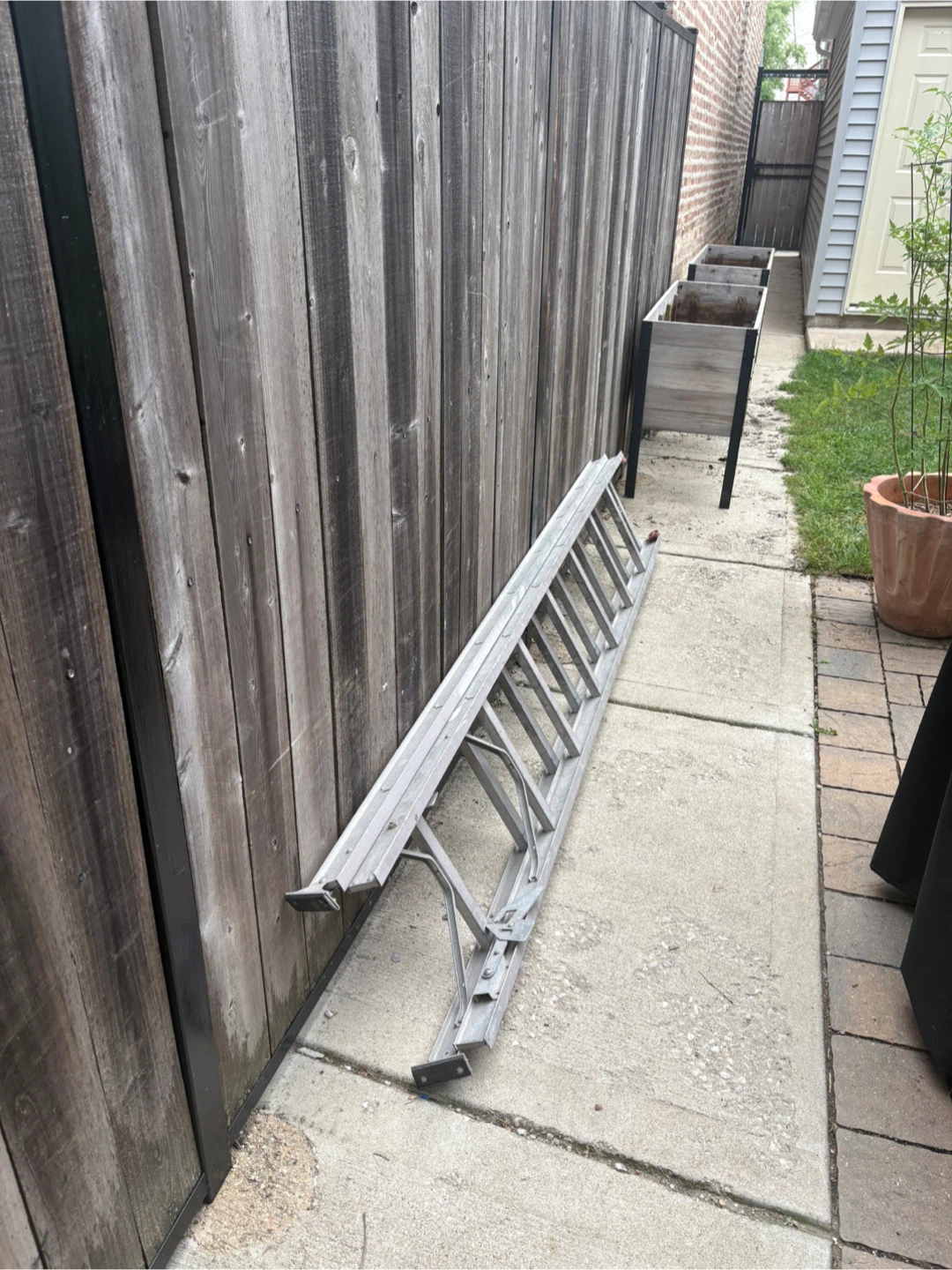 Aluminum Extension Ladder (8’ closed; 16’ open)