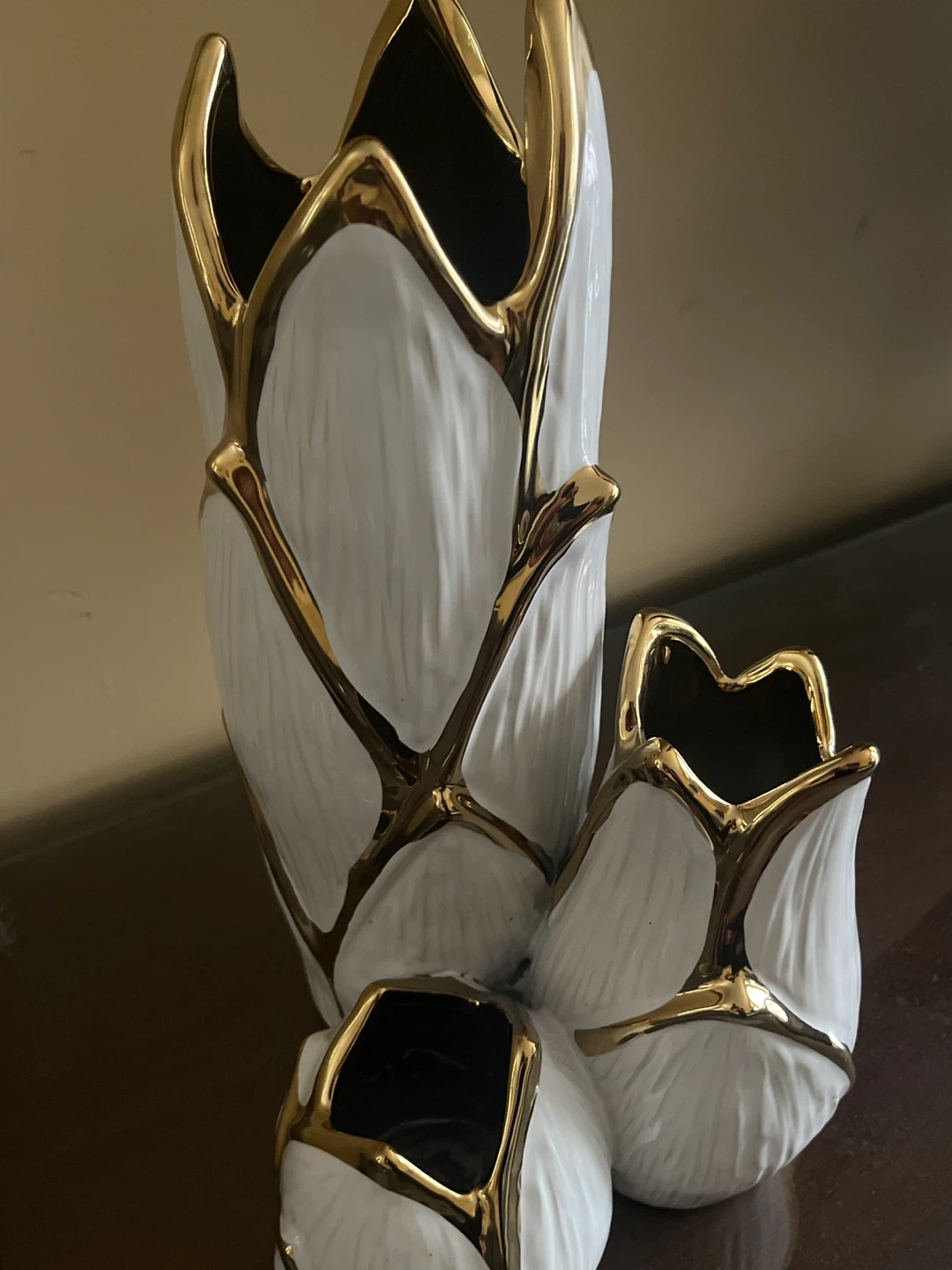 Set of Three White and Gold Ceramic Vases