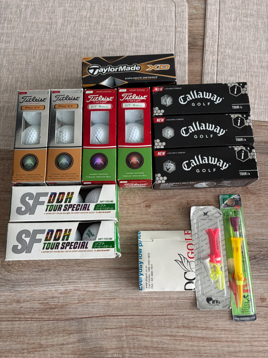 Assorted Golf Balls and Tees Set