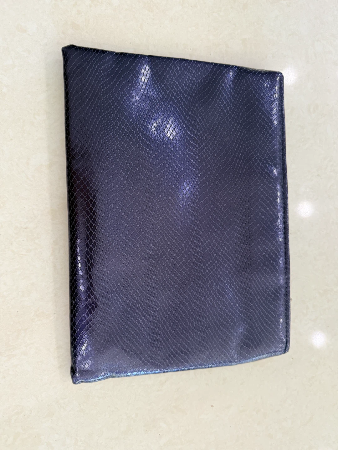 La Prairie dark blue cosmetic pouch