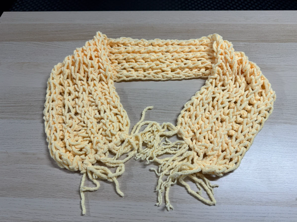 Pale Yellow Knitted Scarf with Fringe