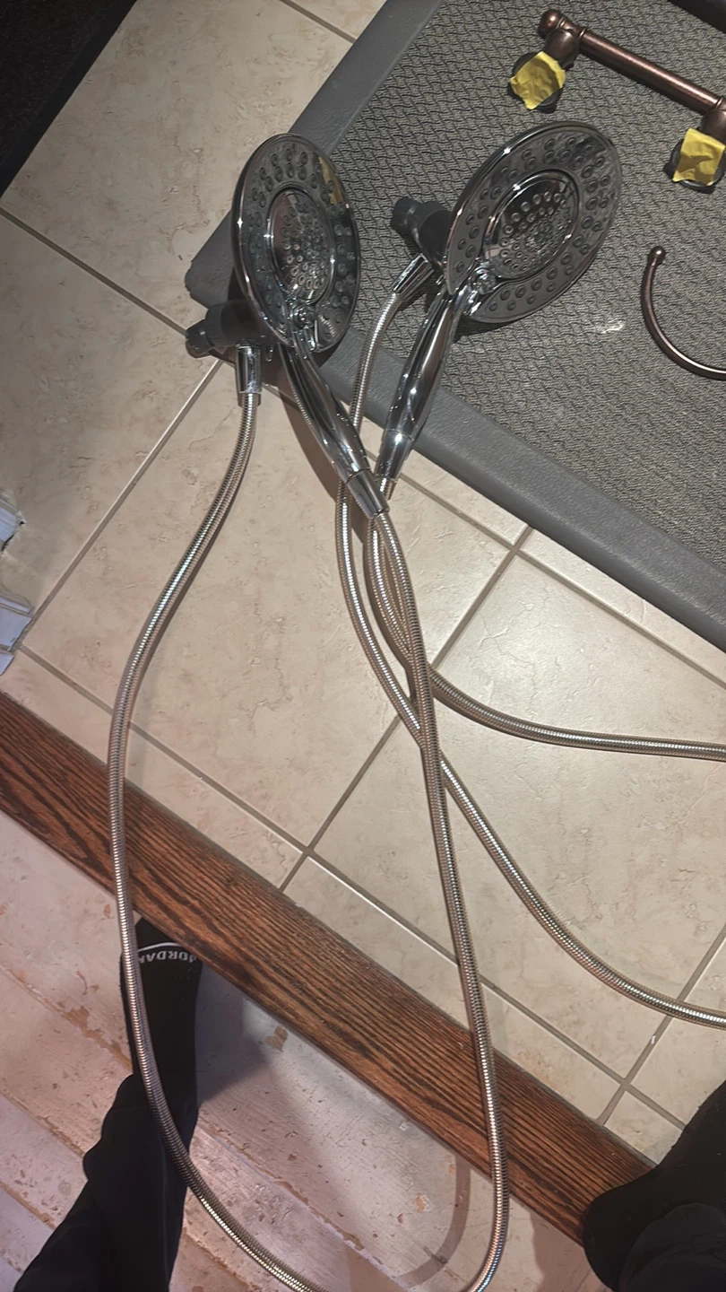 Two Chrome Handheld Shower Heads