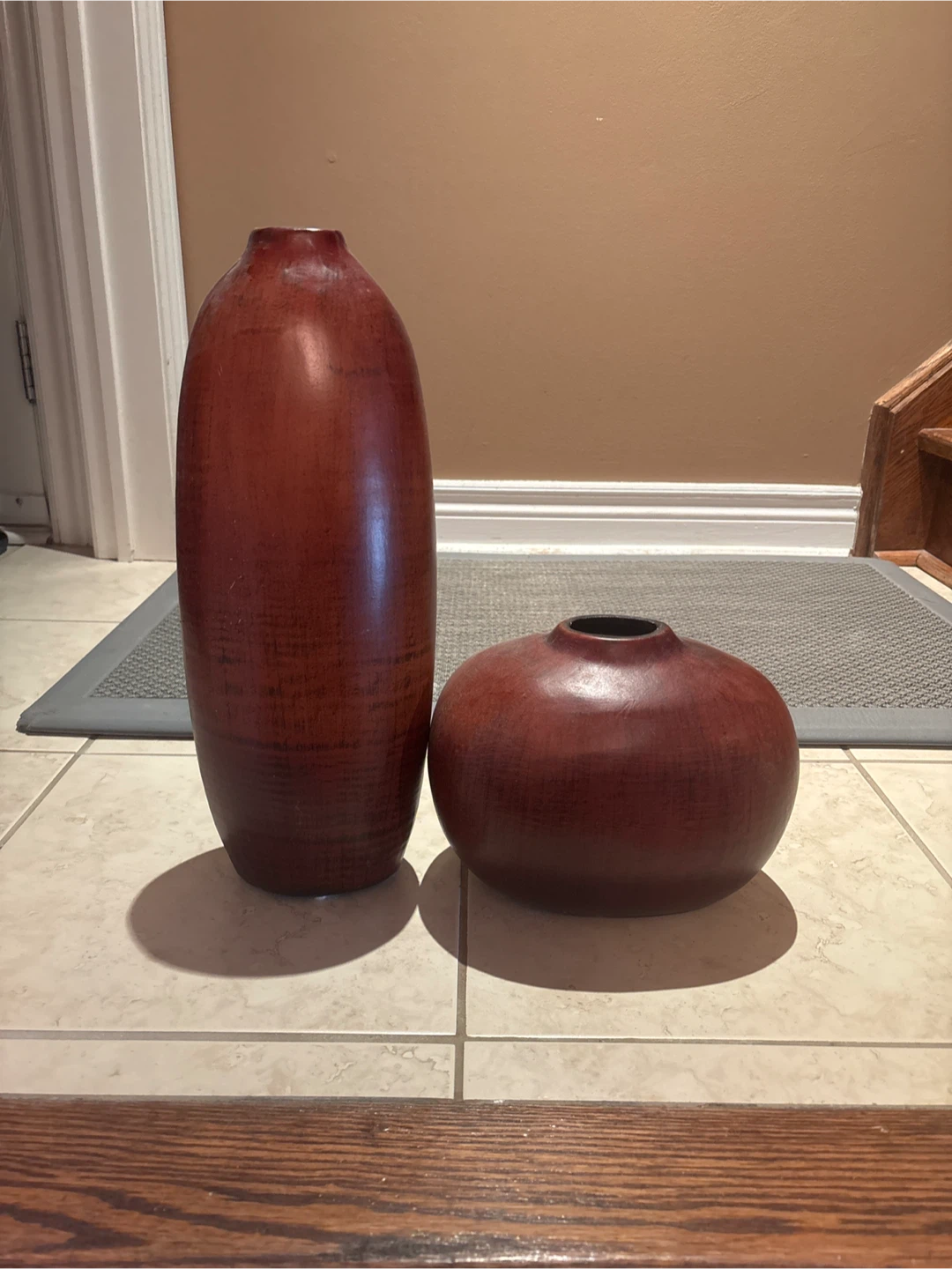 Two Brown Wooden Vases