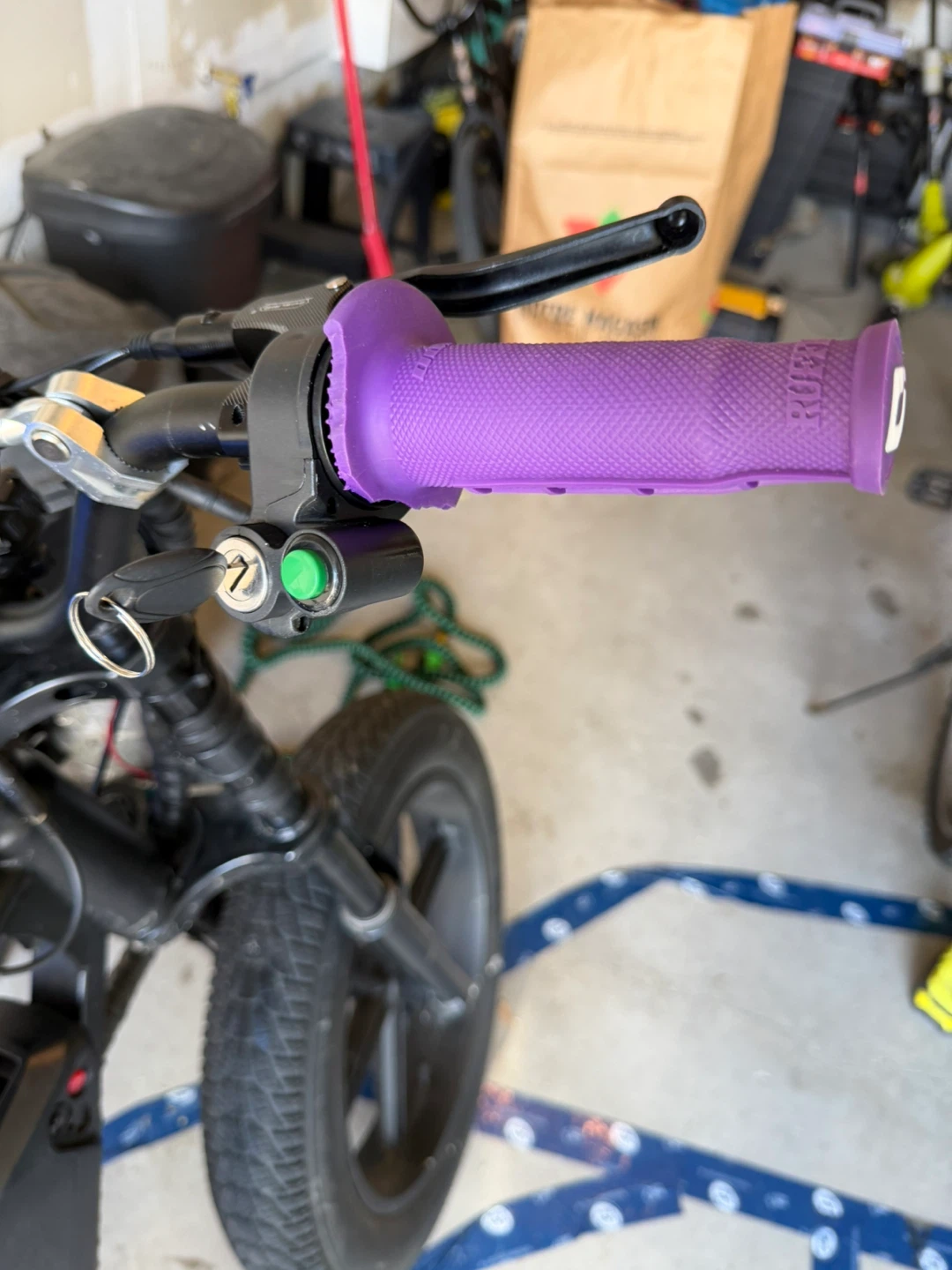 Black Electric Bike with Purple Grips