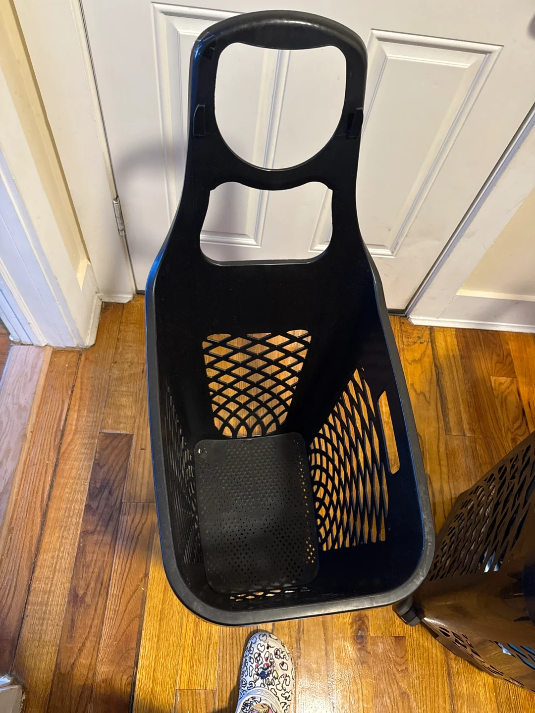A laundry basket with wheels