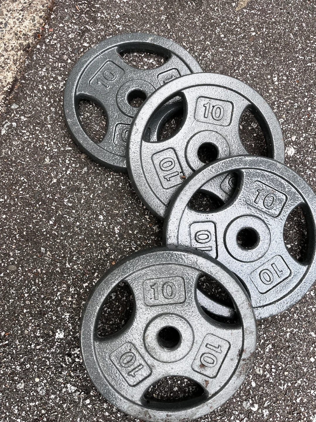 Four 10lb Cast Iron Weight Plates