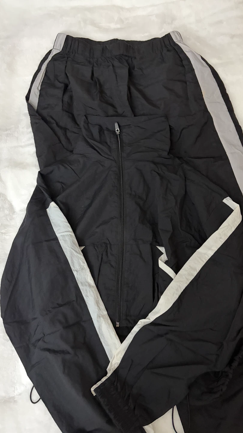 Black matching track pants and zip up set