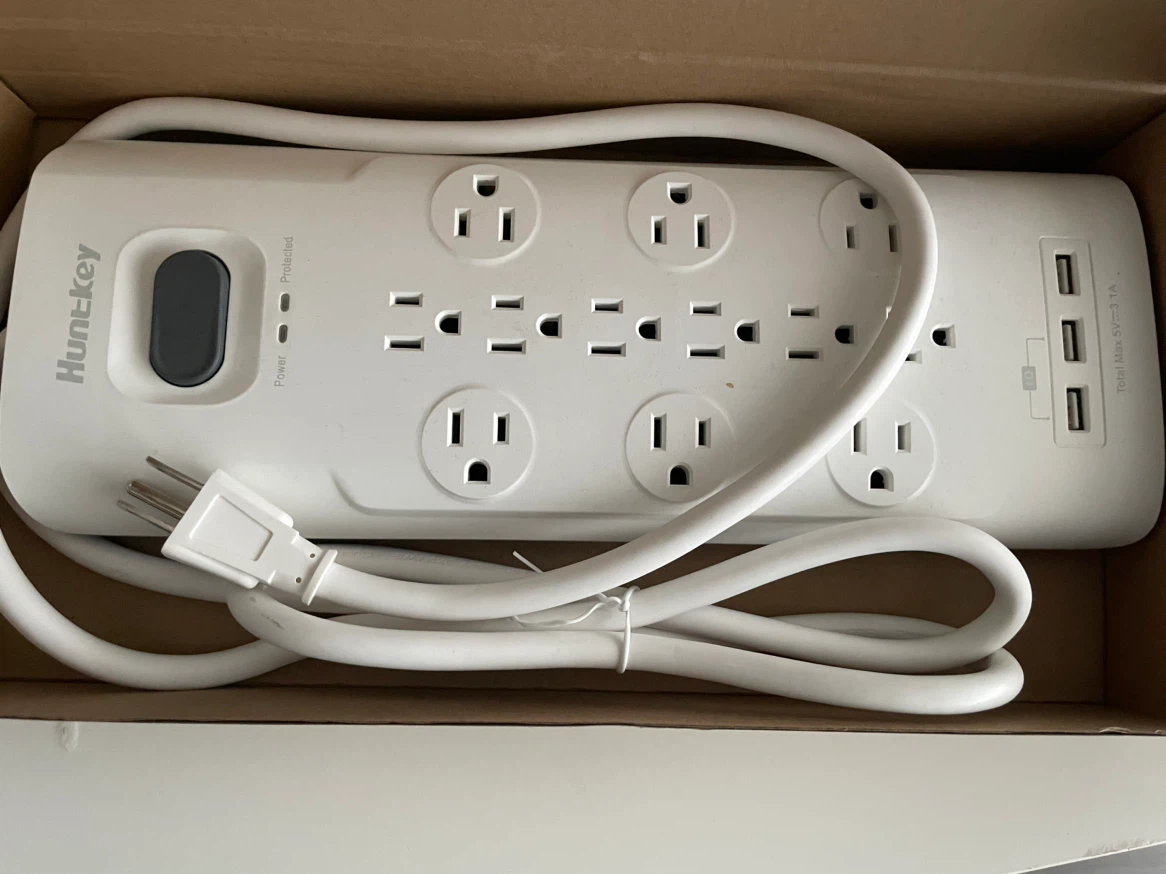 Huntkey 12-Outlet Surge Protector with 3 USB Ports – Like New