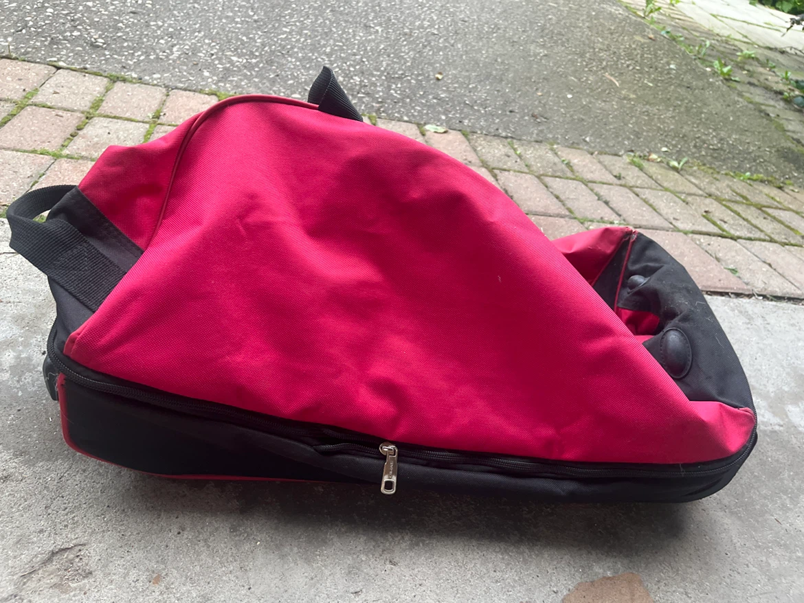Red and Black Rolling Duffle bag suitcase