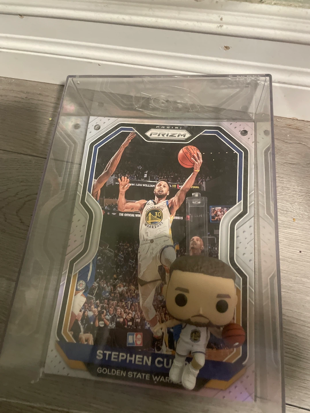 Stephen Curry Panini Prizm Card and Funko Pop Figure