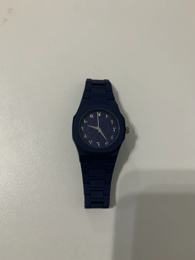 Blue Wristwatch with Arabic Numerals