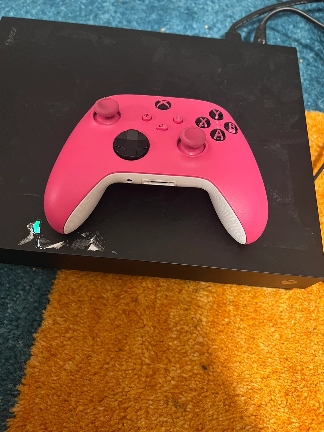 Xbox One X Console with pink Wireless Controller