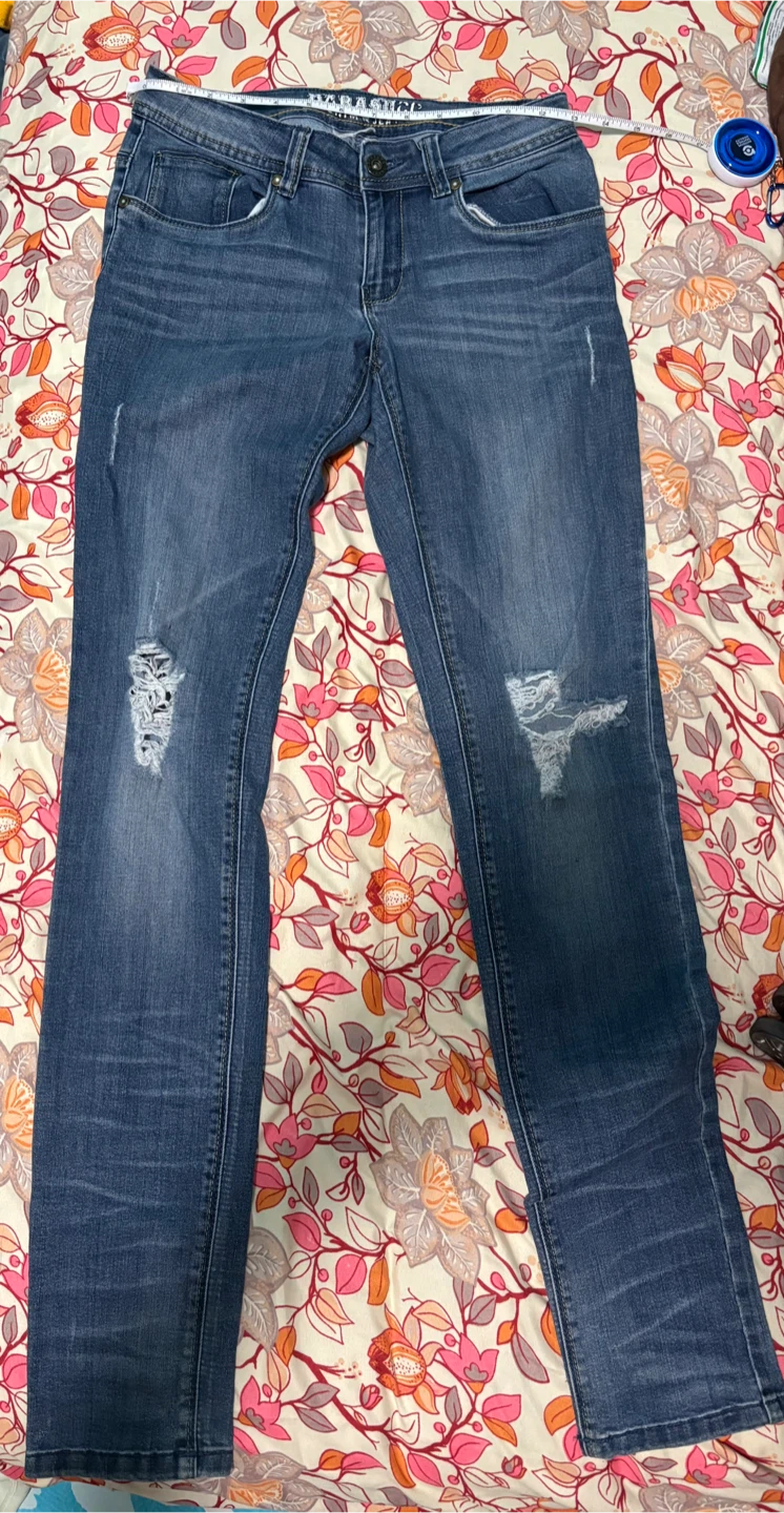 Blue ripped/distressed jeans