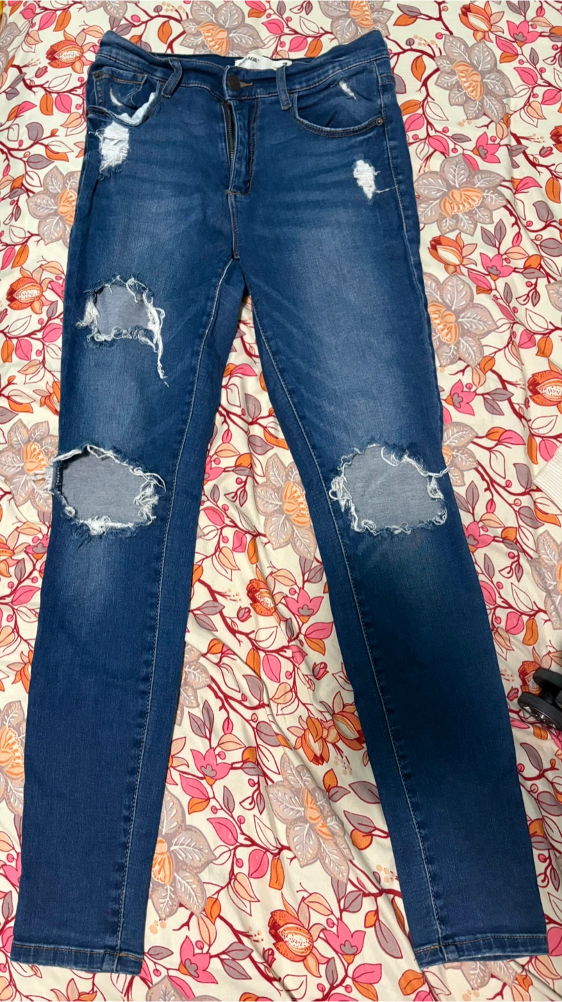 Blue ripped jeans