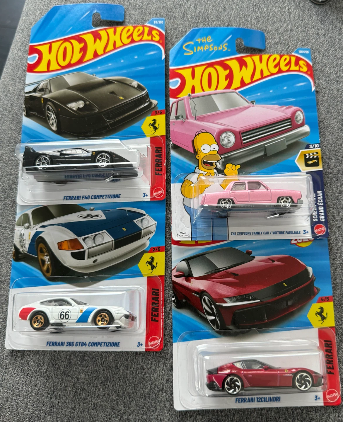 Lot of 4 Hot Wheels Cars - Ferrari and The Simpsons