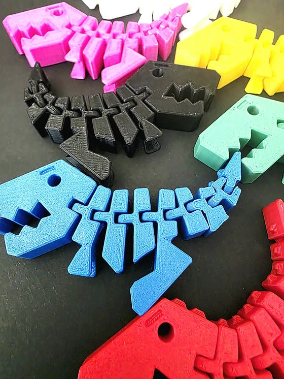 Articulated Dinosaur Skeleton Fidget Toy and Ribbon 🎀 Keychains