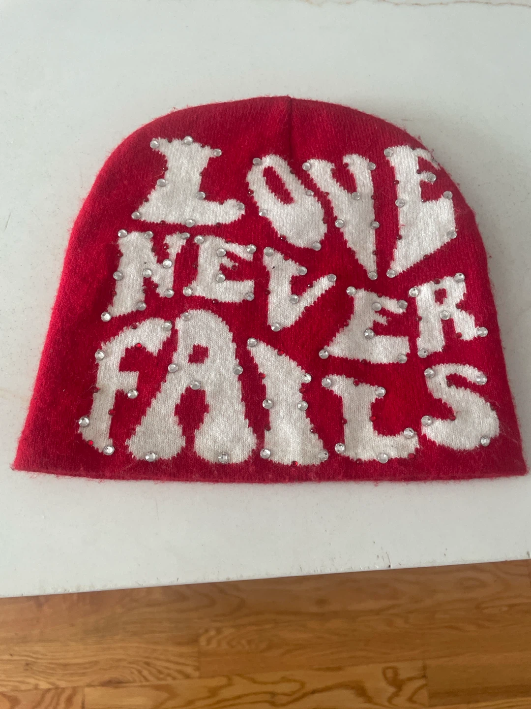 Red Beanie Hat "Love Never Fails"