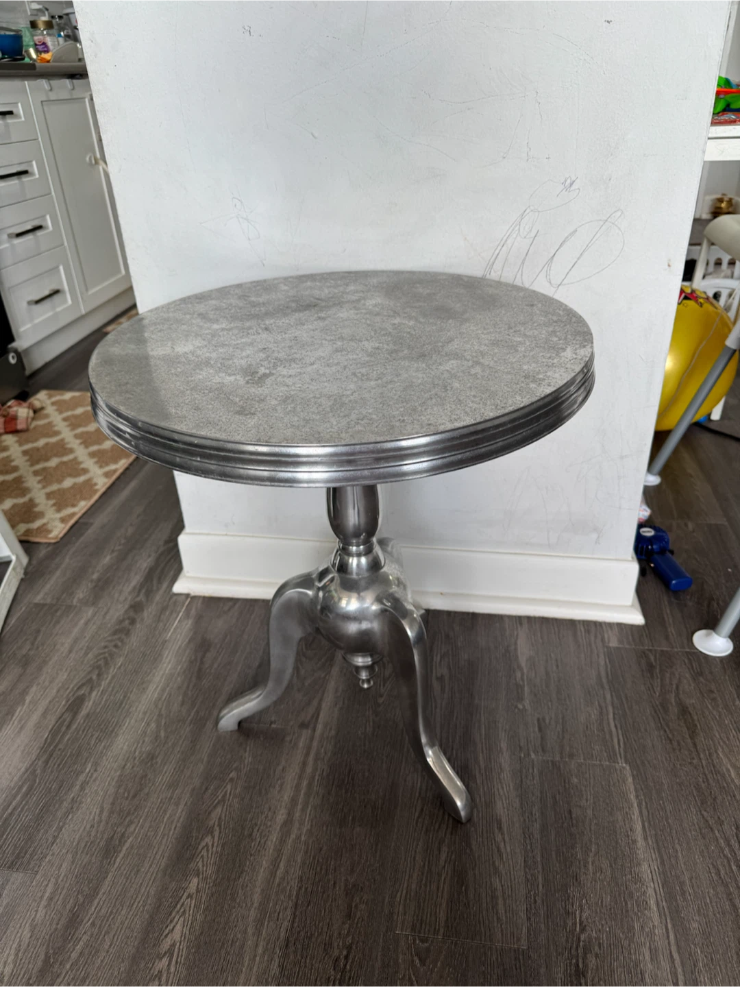 Round metal pedestal side table