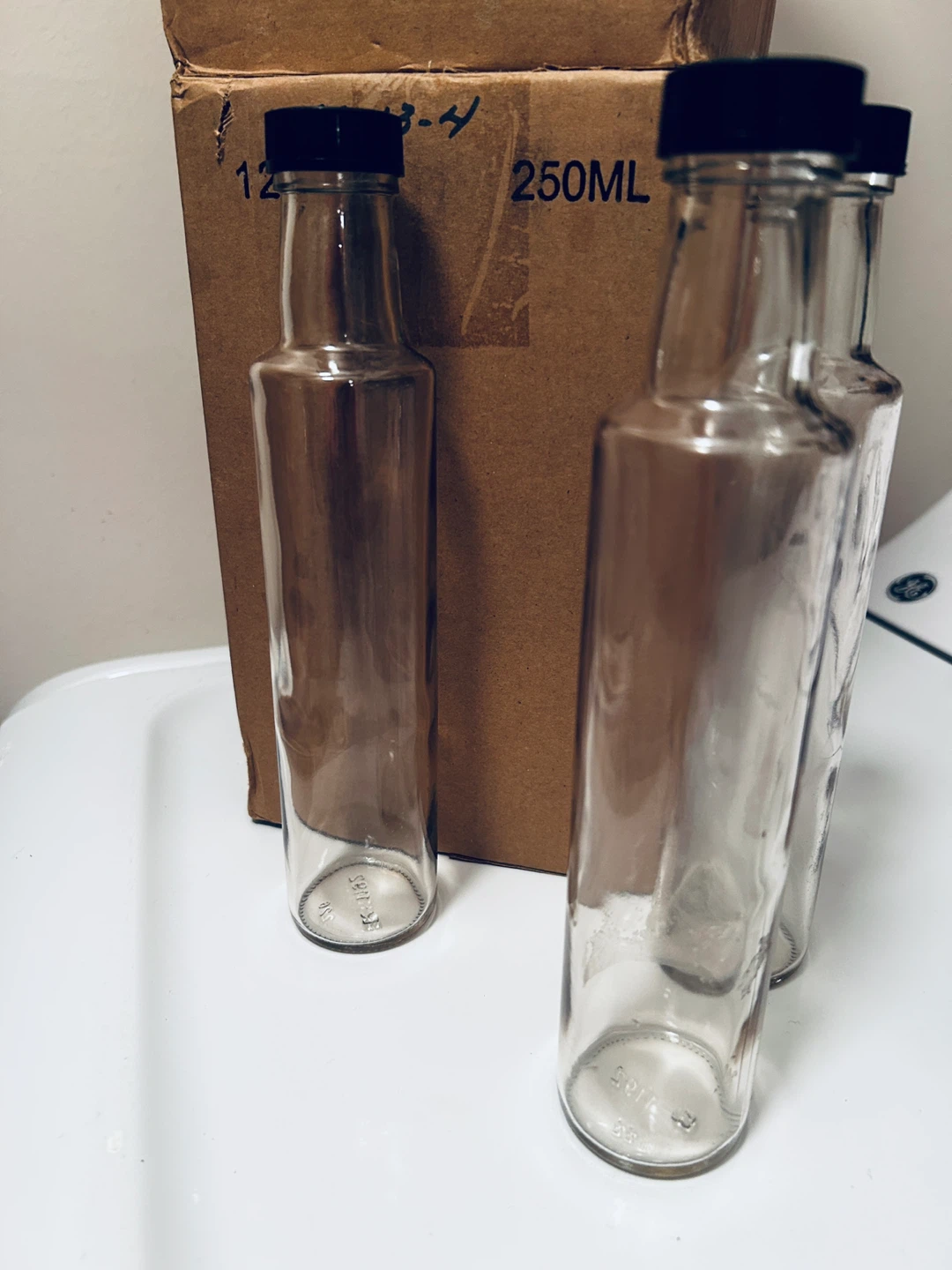 24 Glass Bottles: EACH 250ml or 8.5 ounces