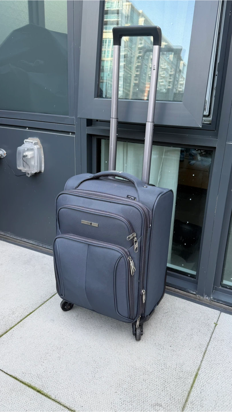 Softside Carry-On Expandable 4-Wheel Luggage